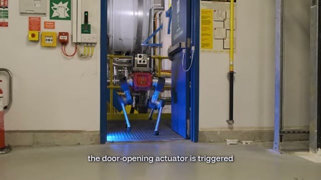 Still at01:36 from LEGIC’s September17,2026 door-access demonstration, showing ANYmal approaching the access-controlled doorway. Source footage, not a new October deployment.