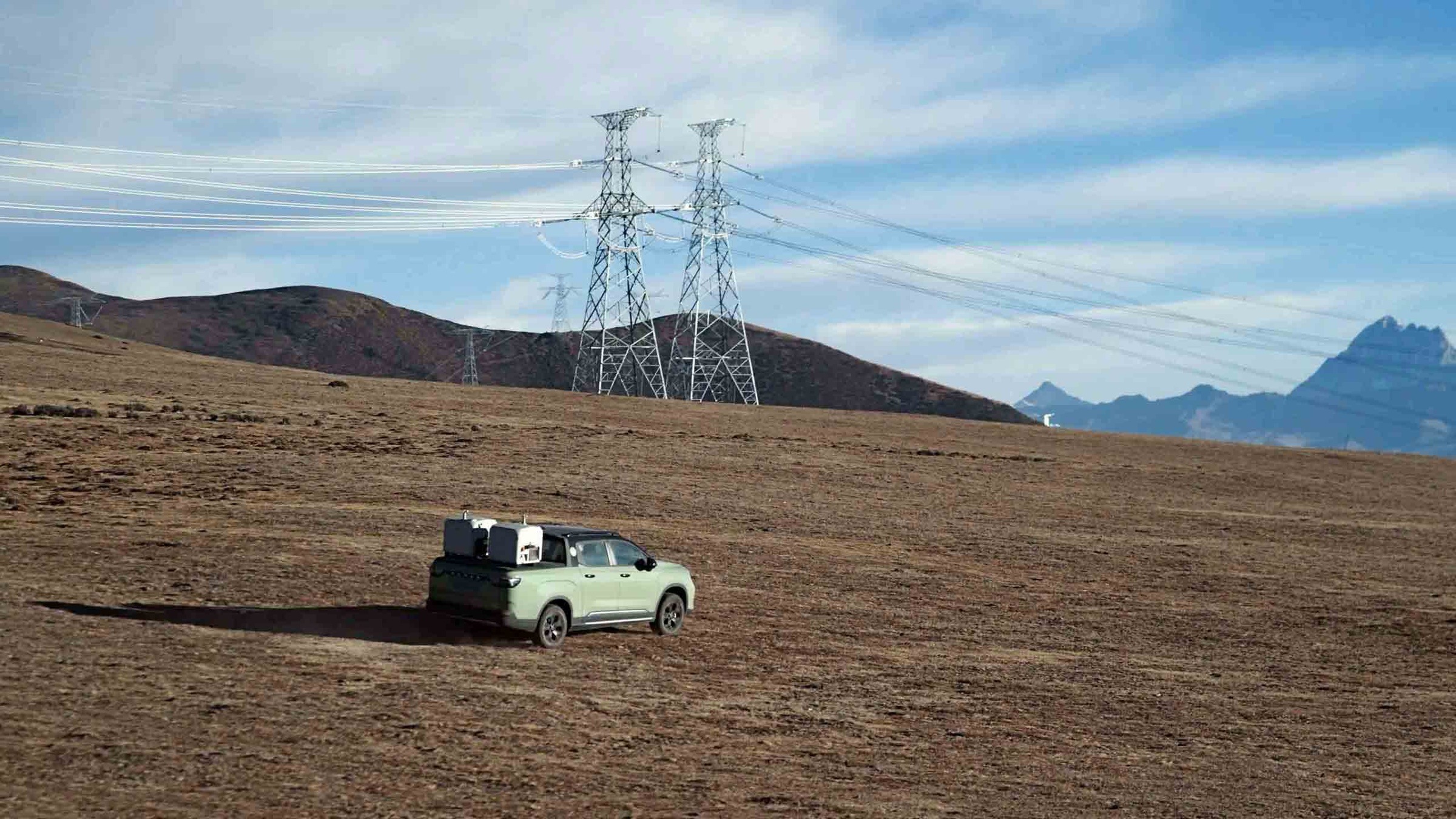 DJI Dock 3 units mounted on a vehicle near power infrastructure